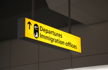 Departures and Immigration wayfinding sign at airport